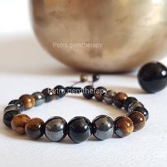 دستبند-مردانه-حدید-و-عقیق-سلیمانی-و-چشم-ببر